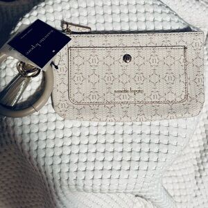 Nanette Lepore, wristlet gold hardware, zipper closure, extra pockets.
